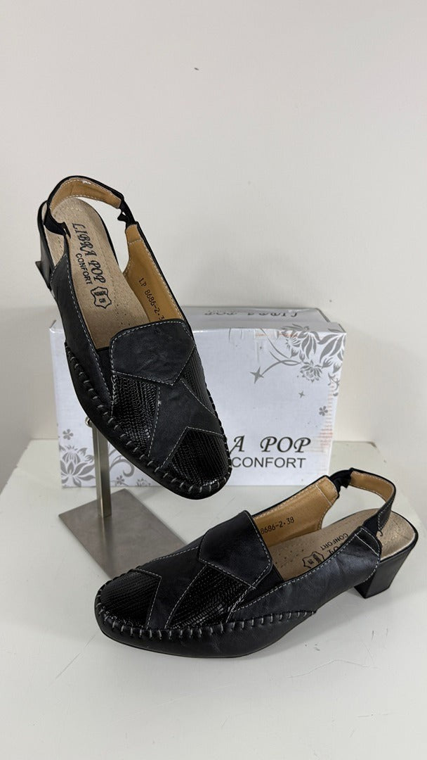 Sandales Frippindealz LIBRA POP noires en cuir avec talon confortable, bride élastique et coutures contrastées