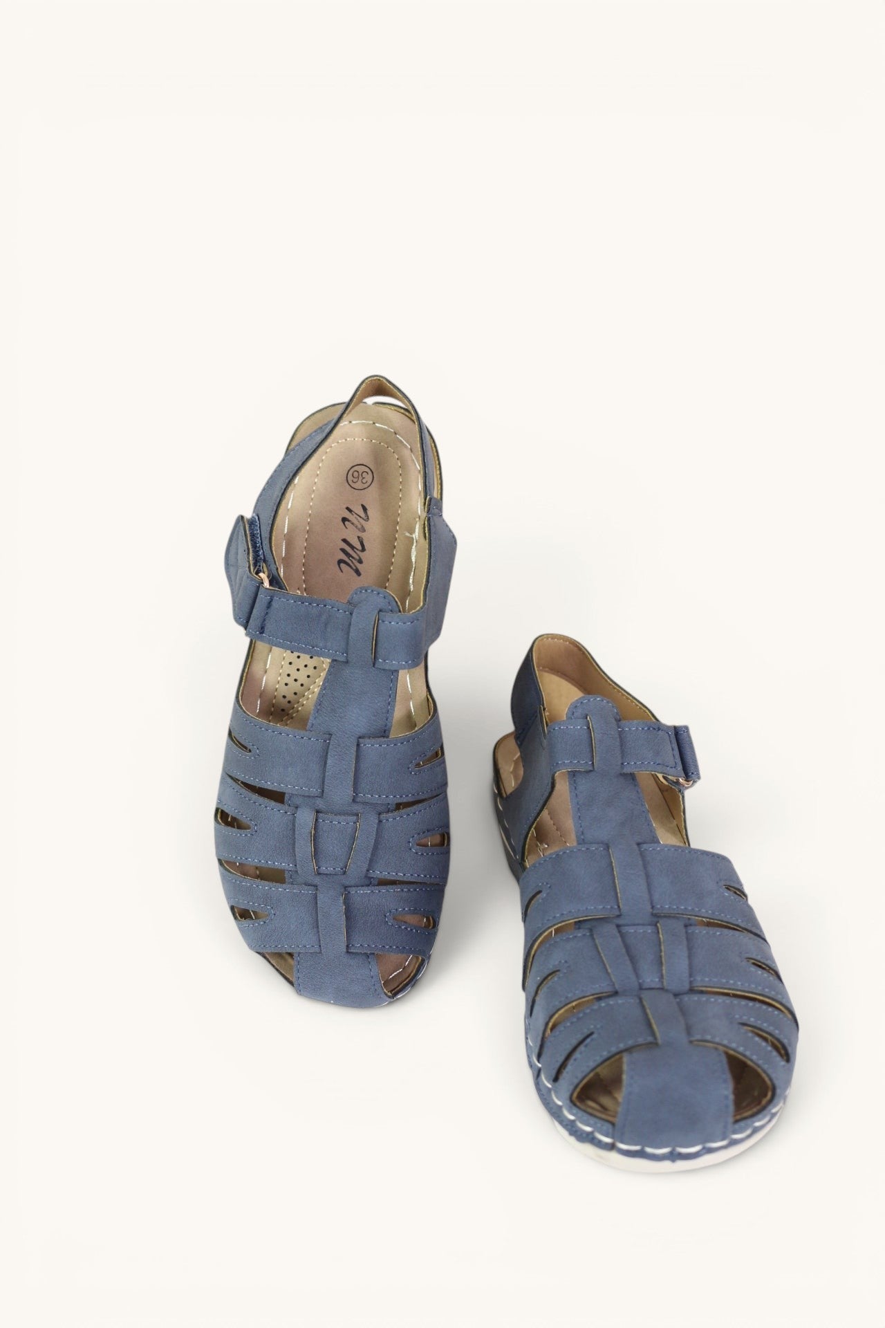 Sandales confort Frippindealz bleu marine pour femme avec design ajouré, bride auto-agrippante et semelle compensée