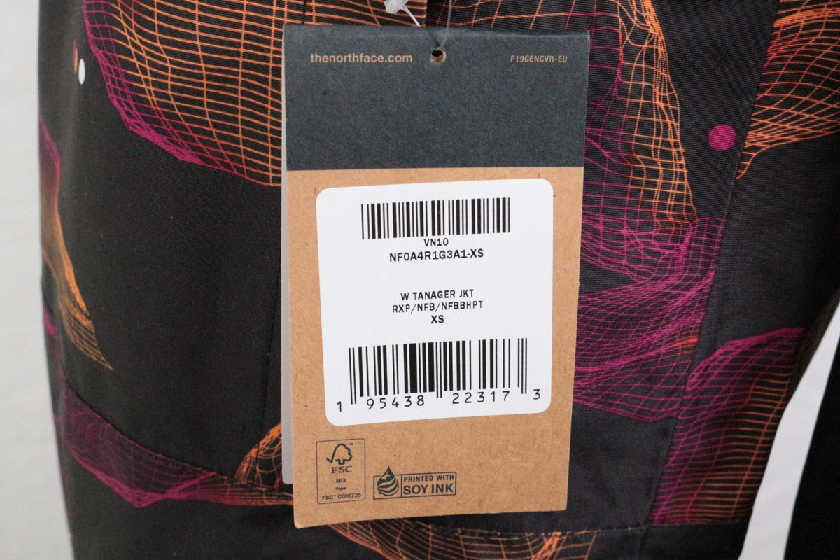 Étiquette de prix Frippindealz sur veste de ski The North Face à motif géométrique rose et noir