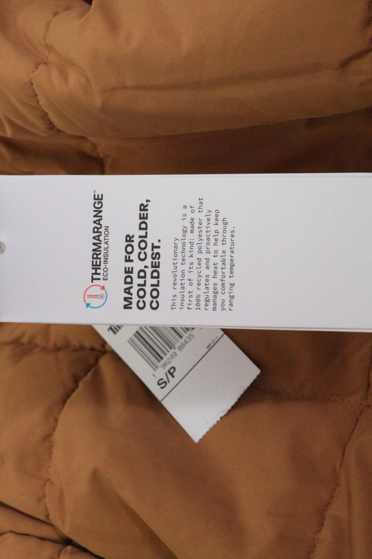 Étiquette de veste Frippindealz Timberland camel avec technologie d'isolation thermique Thermarange pour temps froid