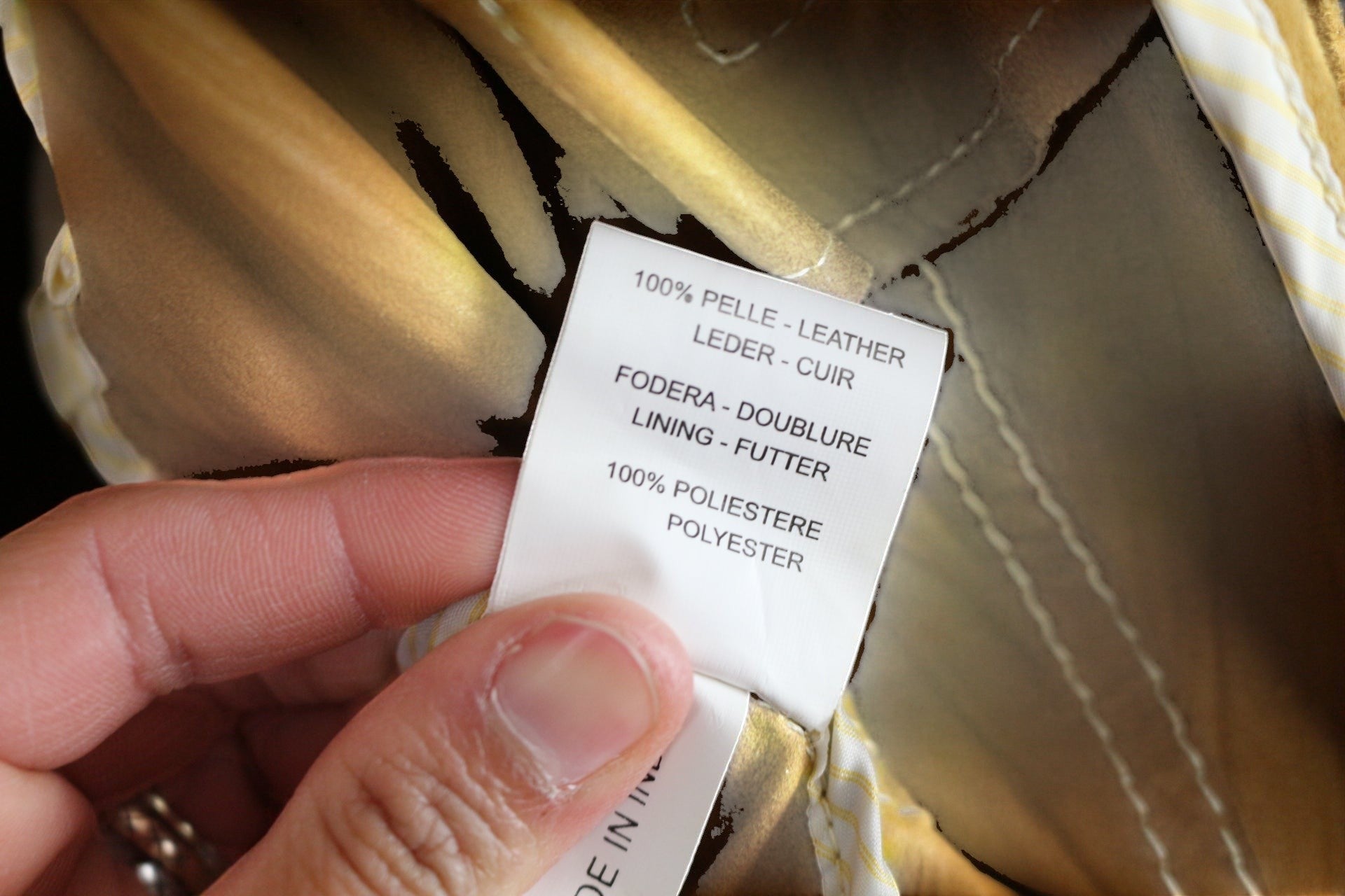 Veste en cuir camel Milestone taille M, doublure polyester, coutures apparentes et poches audacieuses. État : très bon.