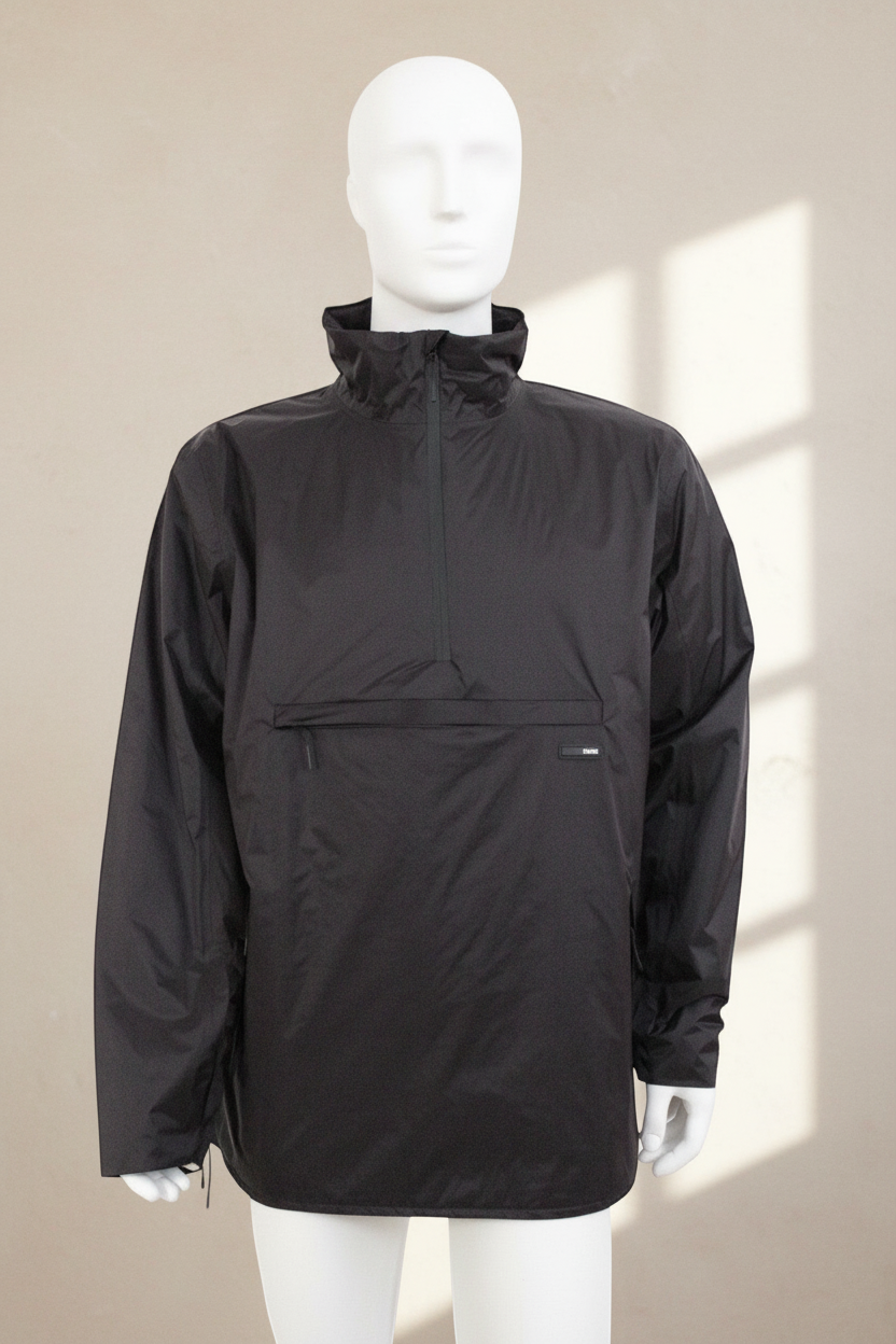 Veste imperméable unisexe noire Frippindealz en polyamide avec col montant et grande poche avant zippée