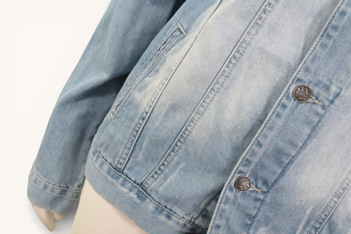 Veste en jean bleu délavé Rerock 4ever avec boutons métalliques gravés, proposée par Frippindealz