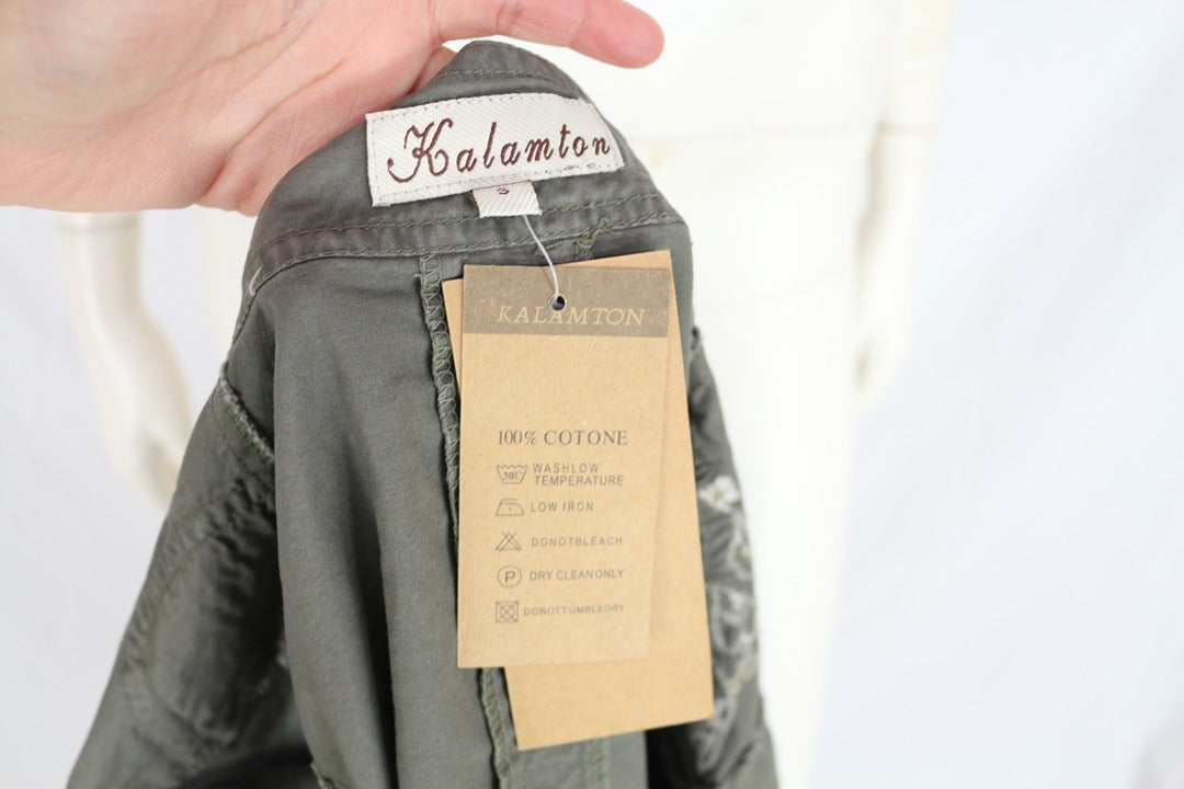 Veste militaire Frippindealz Kalamton en coton kaki avec étiquette de composition et marque visible