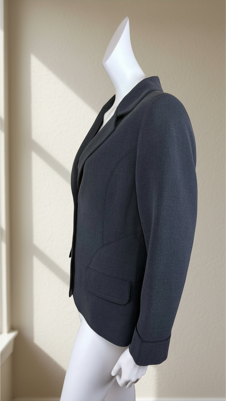 Veste vintage Frippindealz gris foncé en viscose et polyester, coupe chic et rétro, vue de profil sur mannequin.
