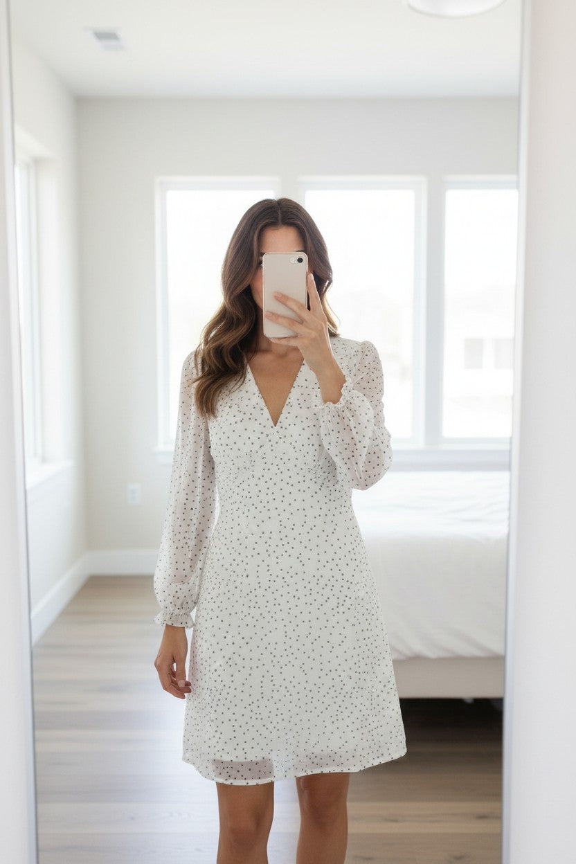 Frippindealz white and black polka dot polyester cotton midi dress with V-neck and long sleeves.