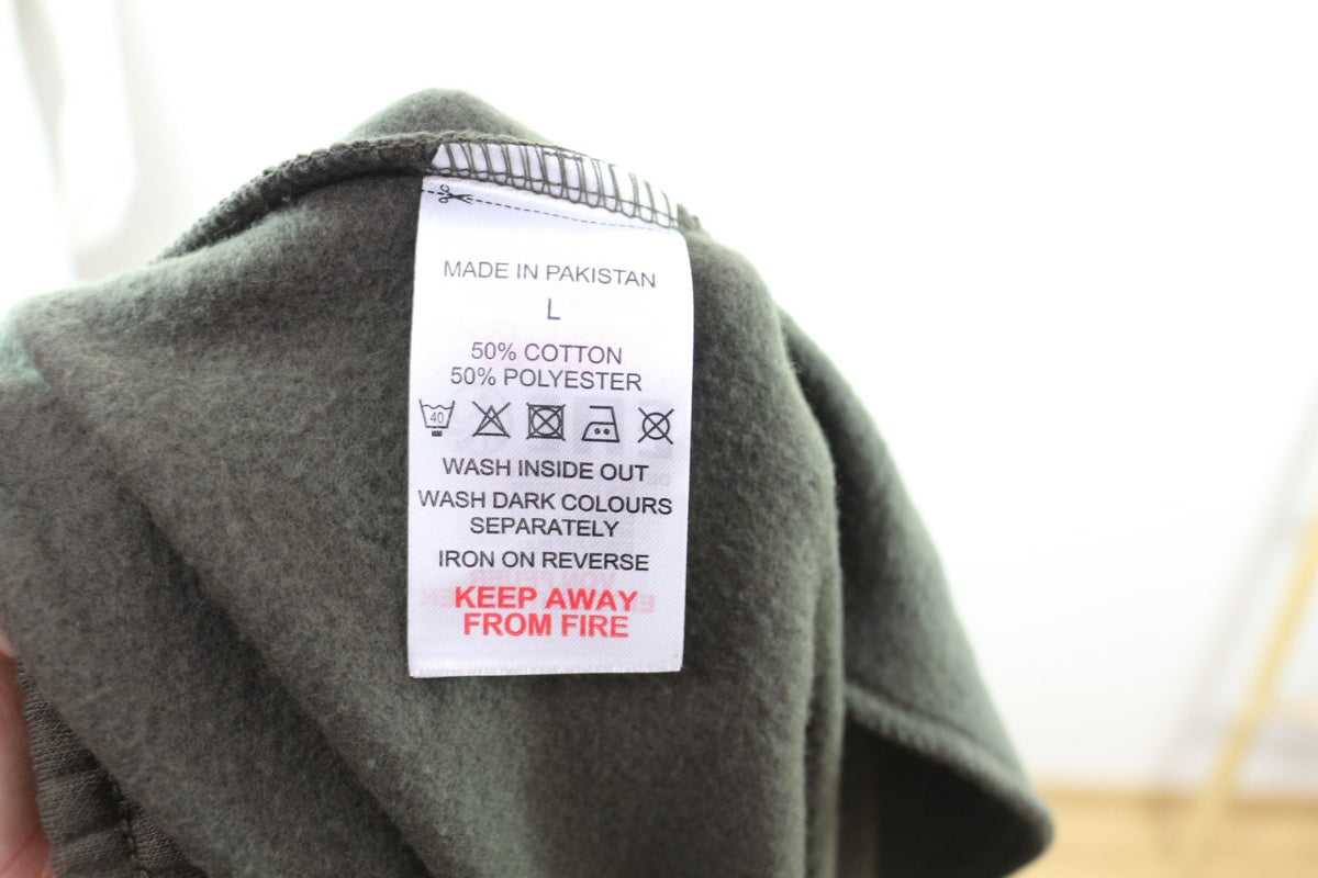 Étiquette de composition du jogging Genetic Apparel : 50 % coton, 50 % polyester – Frippin'Dealz