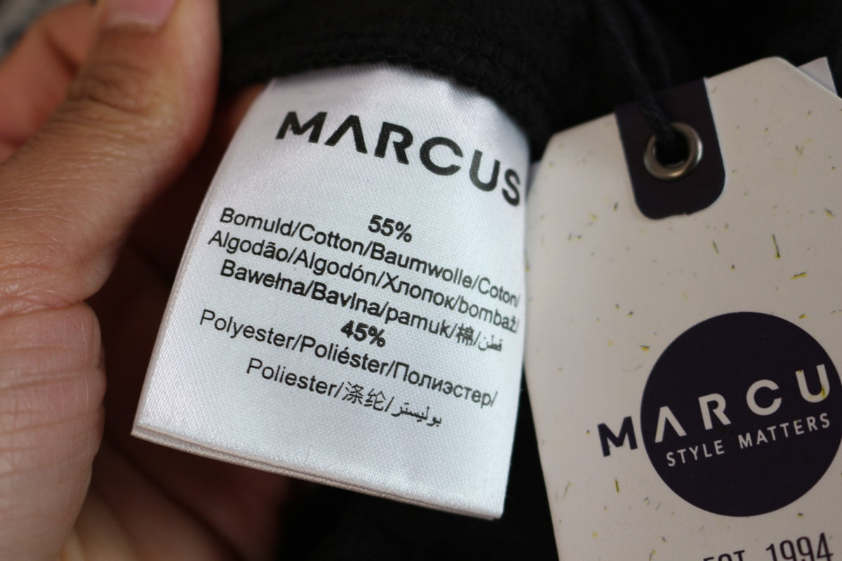 Étiquette de composition du jogging Marcus : 55 % coton, 45 % polyester – Frippin'Dealz
