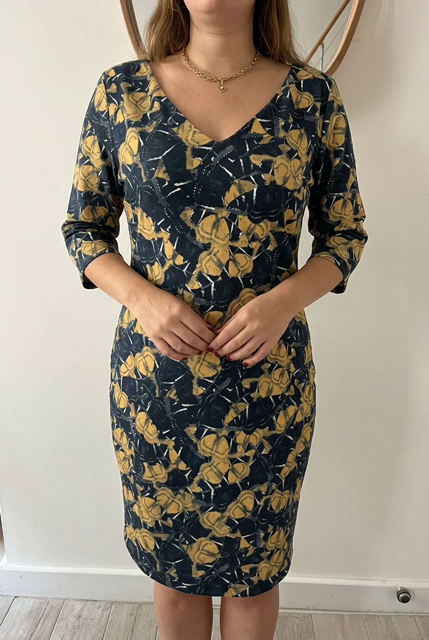 Robe midi La Fée Maraboutée noire jaune motif graphique taille 40