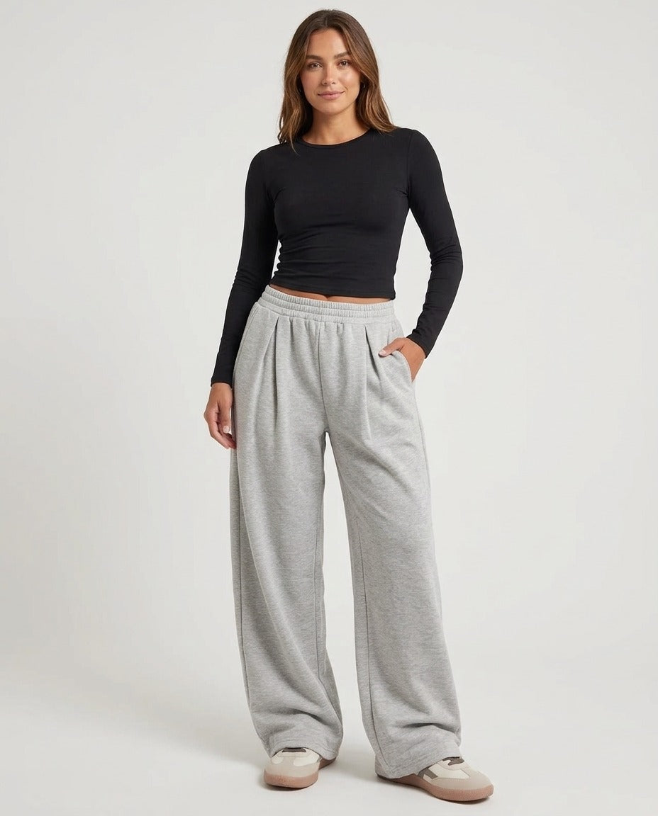 Pantalon jogging jambe large taille élastique poches gris ou noir porté – photo générée par IA