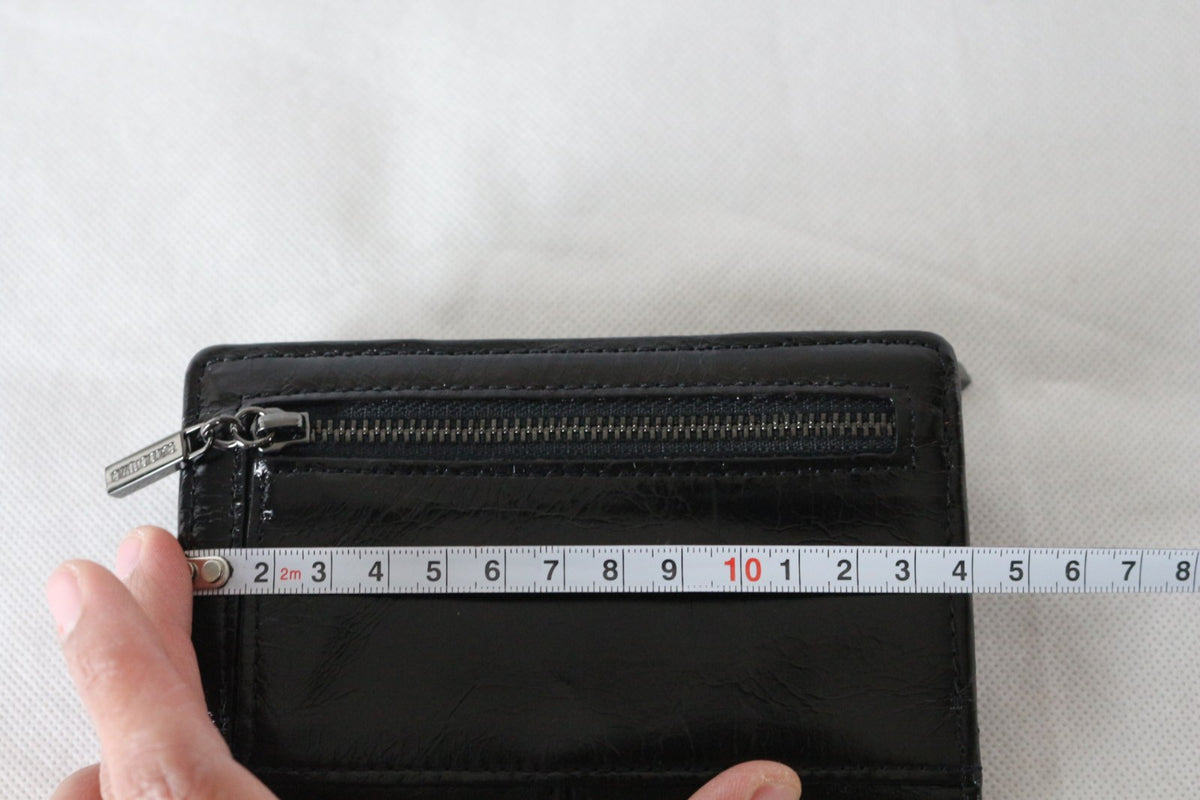 Compartiment zippé intérieur du portefeuille Claudio Ferrici avec doublure à monogramme – Frippin'Dealz