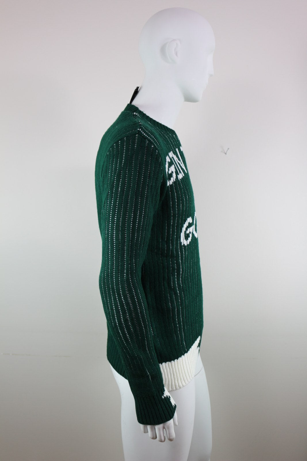 Pull Millions Man vert vu de profil, manche longue et maille côtelée – Frippin'Dealz