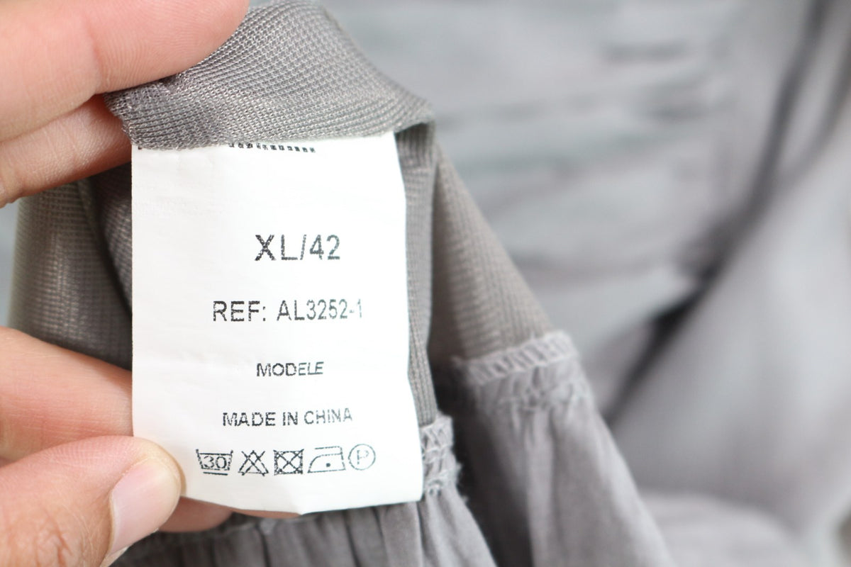 Étiquette de taille XL/42 de la robe Sépia – Frippin'Dealz