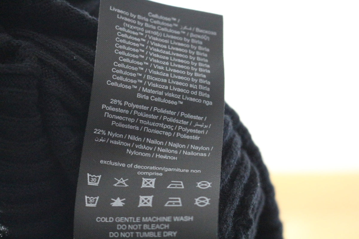 Étiquette de composition de la robe Vero Moda : viscose, polyester, nylon et conseils d'entretien – Frippin'Dealz