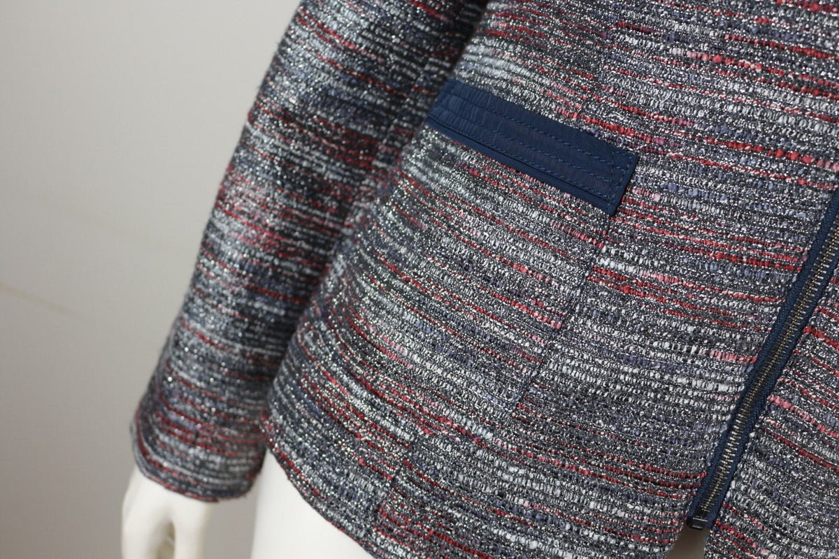 Détail de la poche à liseré marine et du tissage tweed métallisé de la veste edc – Frippin'Dealz